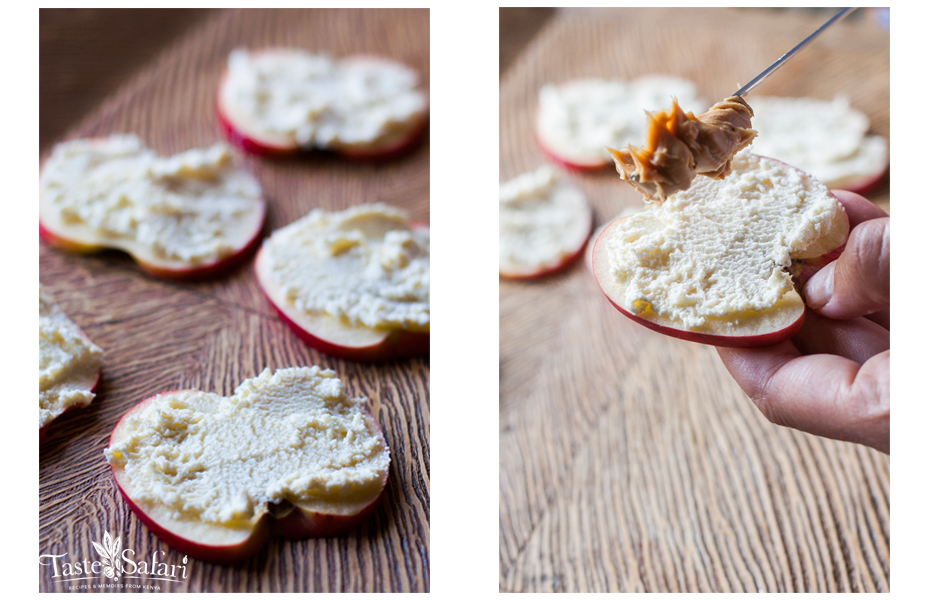 Close-up of an apple slice layered with peanut butter and muesli
